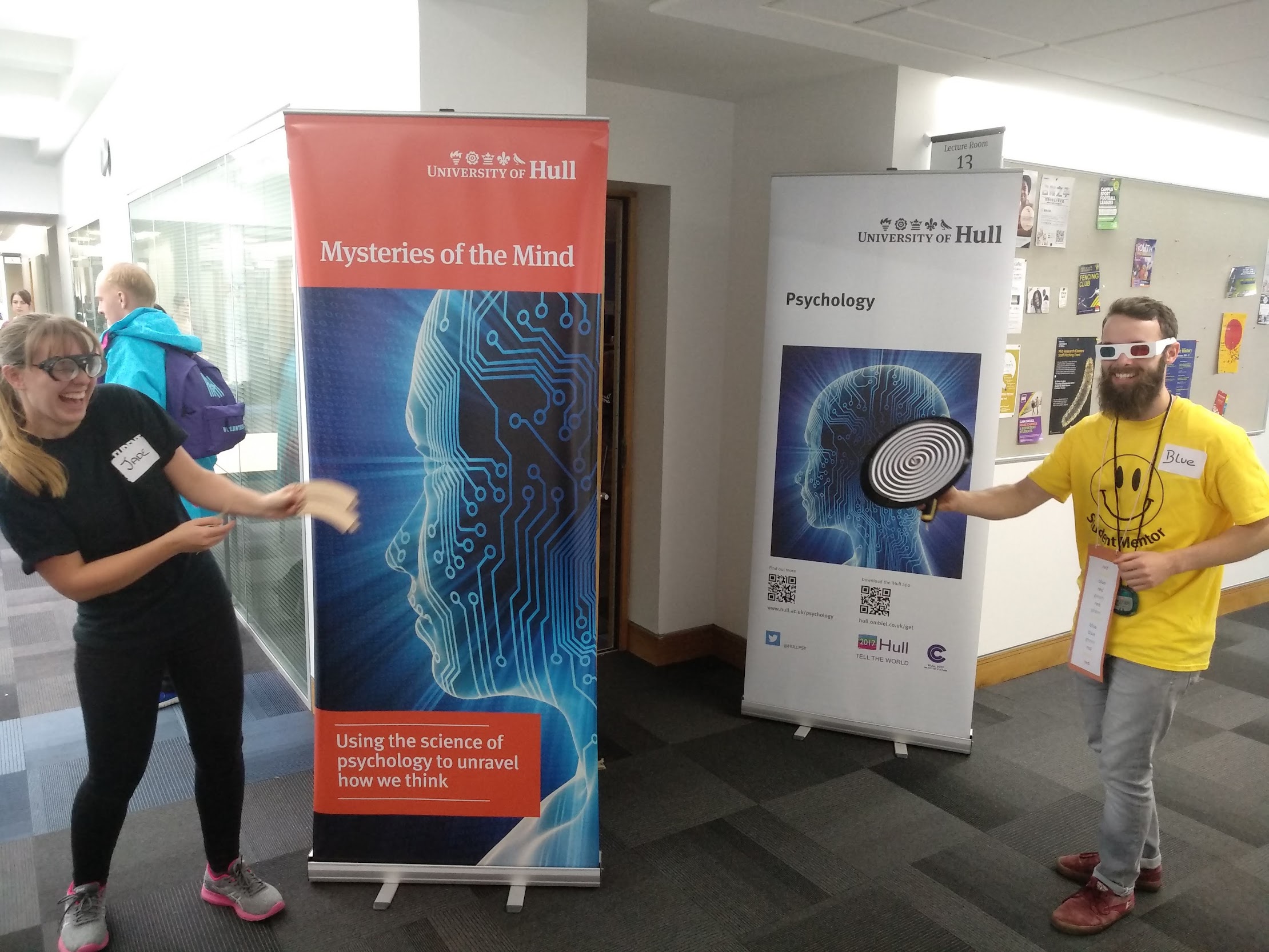 Demonstrators at the Mysteries of the Mind and Psychology stand.