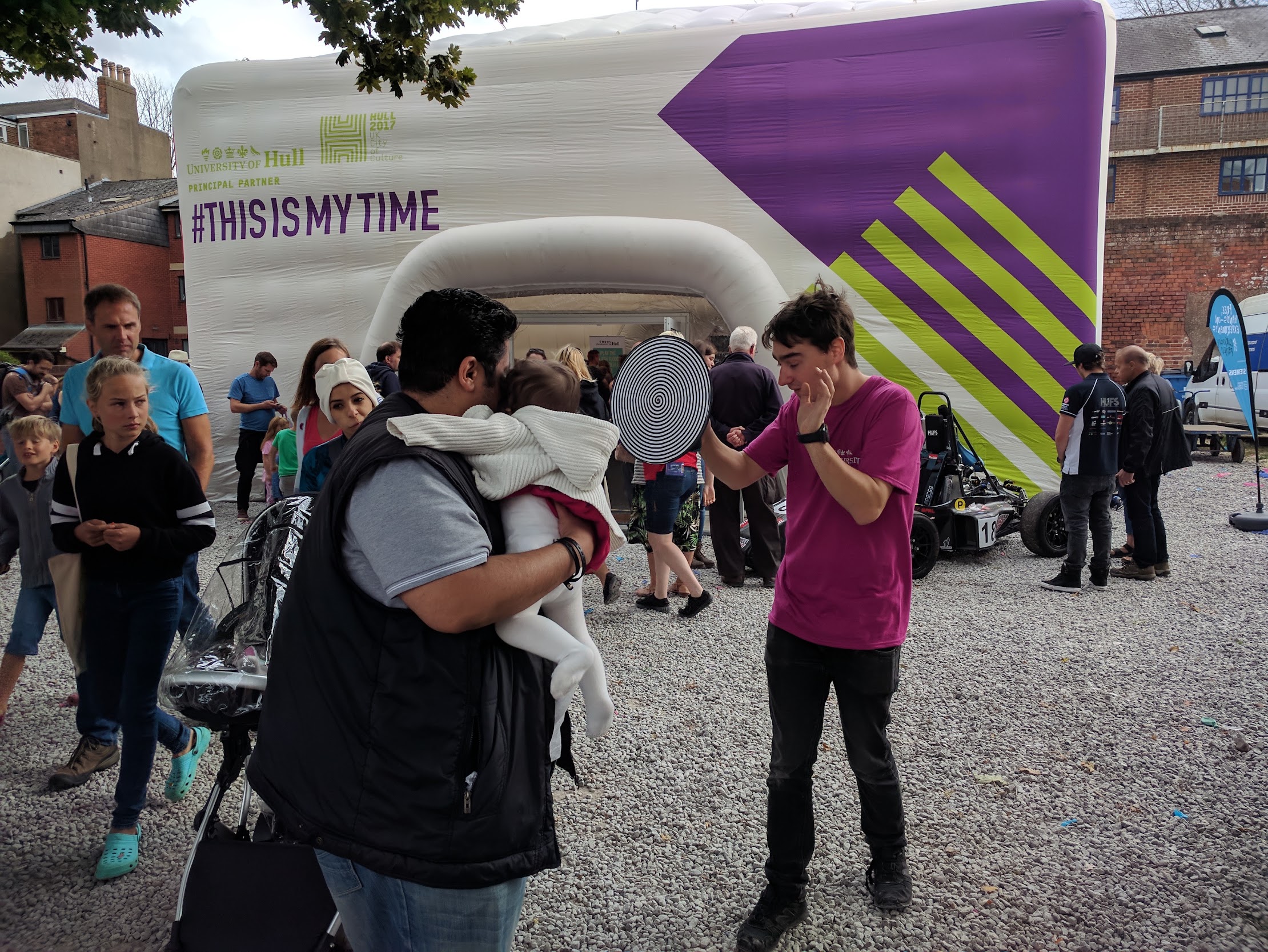 Visitors taking part in an outdoor public engagement event.