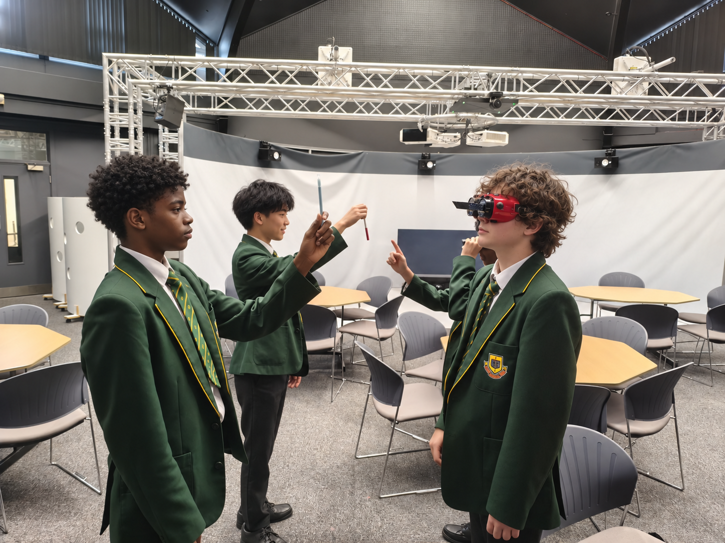 Students explore visual perception using goggles and rods.